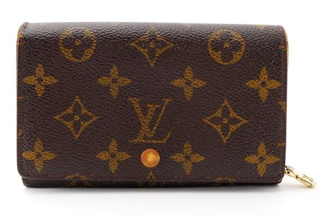 catogram louis vuitton portafoglio|louis vuitton monogram lookup.